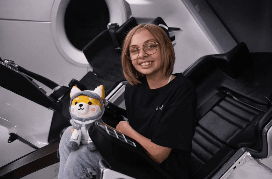 Liv with Asteroid in spacecraft seating